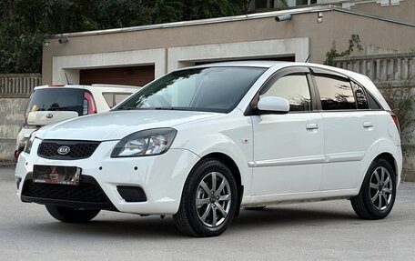 KIA Rio II, 2011 год, 897 000 рублей, 27 фотография