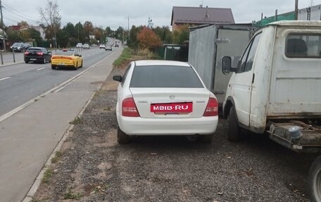 Mazda Familia, 2003 год, 150 000 рублей, 2 фотография