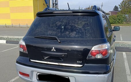 Mitsubishi Outlander III рестайлинг 3, 2004 год, 670 000 рублей, 20 фотография