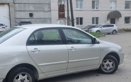 Toyota Corolla, 2004 год, 690 000 рублей, 4 фотография