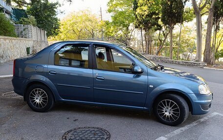 Renault Logan I, 2011 год, 700 000 рублей, 2 фотография