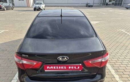 KIA Rio III рестайлинг, 2013 год, 885 000 рублей, 21 фотография