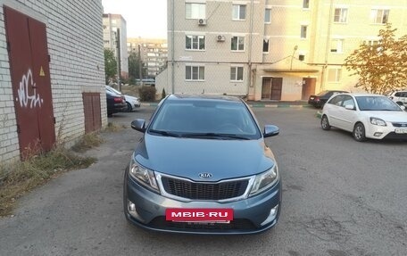 KIA Rio III рестайлинг, 2013 год, 850 000 рублей, 18 фотография