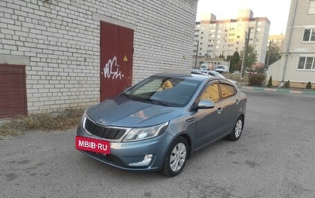 KIA Rio III рестайлинг, 2013 год, 850 000 рублей, 16 фотография