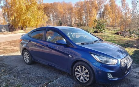 Hyundai Solaris II рестайлинг, 2011 год, 860 000 рублей, 5 фотография