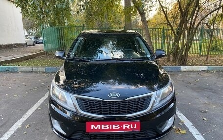 KIA Rio III рестайлинг, 2011 год, 690 000 рублей, 3 фотография