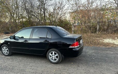 Mitsubishi Lancer IX, 2009 год, 495 000 рублей, 2 фотография