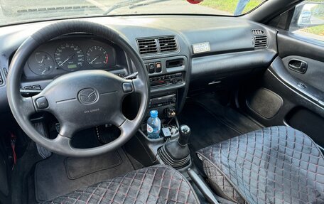 Mazda 323, 1998 год, 199 999 рублей, 9 фотография