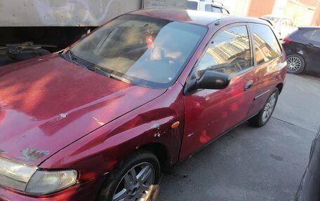 Mazda 323, 1997 год, 140 000 рублей, 4 фотография