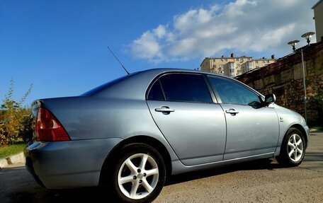 Toyota Corolla, 2004 год, 700 000 рублей, 7 фотография