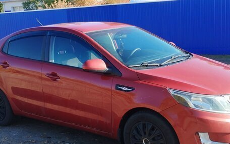 KIA Rio III рестайлинг, 2012 год, 650 000 рублей, 3 фотография