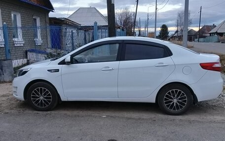 KIA Rio III рестайлинг, 2012 год, 885 000 рублей, 2 фотография