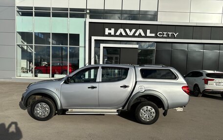 Mitsubishi L200 IV рестайлинг, 2011 год, 1 345 000 рублей, 9 фотография