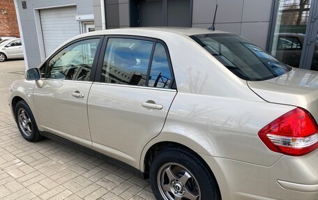 Nissan Tiida, 2010 год, 999 000 рублей, 33 фотография