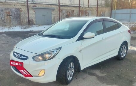 Hyundai Solaris II рестайлинг, 2011 год, 830 000 рублей, 5 фотография