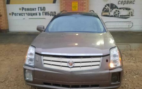 Cadillac SRX II рестайлинг, 2007 год, 600 000 рублей, 6 фотография