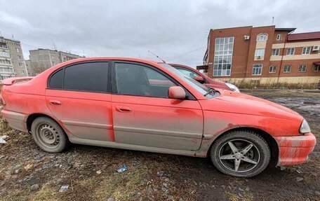 Toyota Avensis III рестайлинг, 2001 год, 290 000 рублей, 23 фотография