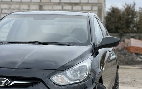 Hyundai Solaris II рестайлинг, 2011 год, 750 000 рублей, 2 фотография