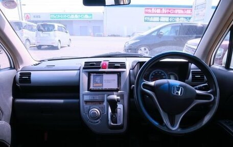 Honda Zest, 2010 год, 560 016 рублей, 9 фотография