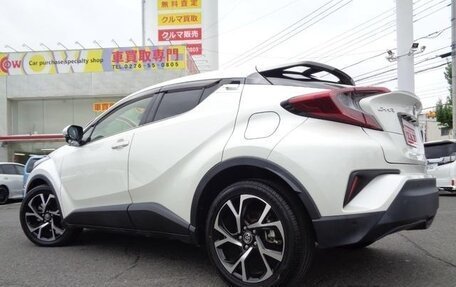 Toyota C-HR I рестайлинг, 2019 год, 1 357 000 рублей, 33 фотография