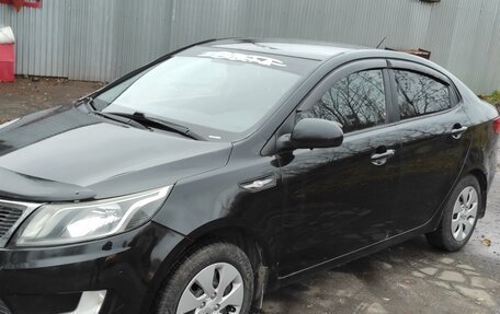 KIA Rio III рестайлинг, 2011 год, 760 000 рублей, 15 фотография