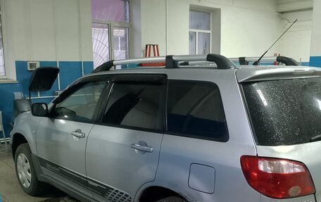 Mitsubishi Outlander III рестайлинг 3, 2005 год, 573 000 рублей, 16 фотография