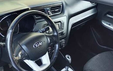 KIA Rio III рестайлинг, 2013 год, 12 фотография