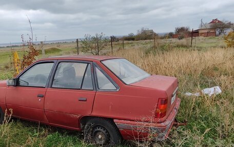 Opel Kadett E рестайлинг, 1986 год, 100 000 рублей, 2 фотография