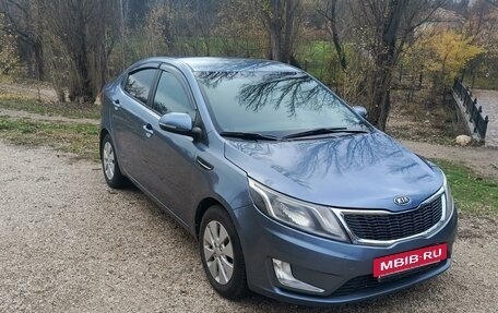 KIA Rio III рестайлинг, 2011 год, 900 000 рублей, 18 фотография