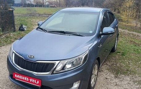 KIA Rio III рестайлинг, 2011 год, 900 000 рублей, 15 фотография