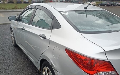 Hyundai Solaris II рестайлинг, 2011 год, 670 000 рублей, 19 фотография