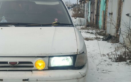 Mazda Familia, 1991 год, 100 000 рублей, 2 фотография