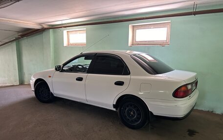 Mazda 323, 1998 год, 380 000 рублей, 3 фотография