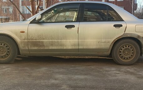 Ford Laser IV, 2001 год, 230 000 рублей, 3 фотография