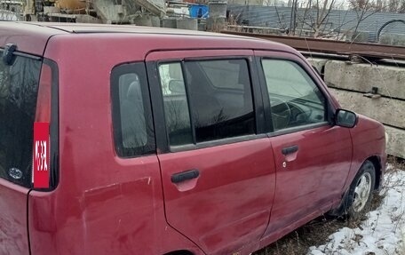 Nissan Cube II, 1999 год, 157 000 рублей, 4 фотография