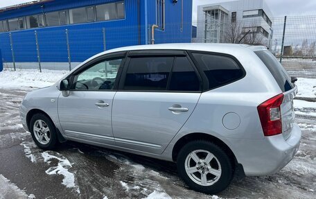 KIA Carens III (RP), 2011 год, 1 049 000 рублей, 4 фотография