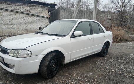 Mazda Familia, 1999 год, 270 000 рублей, 3 фотография