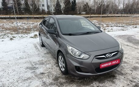 Hyundai Solaris II рестайлинг, 2011 год, 700 000 рублей, 17 фотография