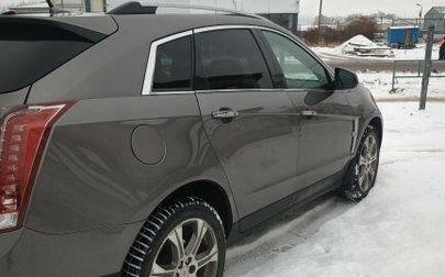 Cadillac SRX II рестайлинг, 2011 год, 1 440 000 рублей, 1 фотография