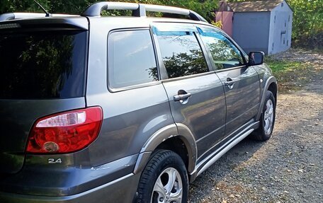 Mitsubishi Outlander III рестайлинг 3, 2006 год, 750 000 рублей, 2 фотография