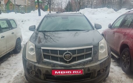 Cadillac SRX II рестайлинг, 2011 год, 1 100 000 рублей, 10 фотография