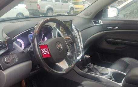 Cadillac SRX II рестайлинг, 2011 год, 1 100 000 рублей, 13 фотография