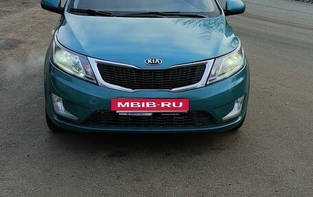 KIA Rio III рестайлинг, 2013 год, 750 000 рублей, 10 фотография