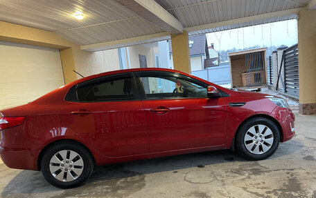 KIA Rio III рестайлинг, 2011 год, 992 000 рублей, 16 фотография