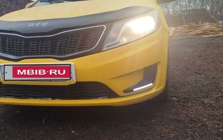 KIA Rio III рестайлинг, 2012 год, 710 000 рублей, 9 фотография