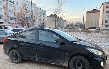 Hyundai Solaris II рестайлинг, 2011 год, 650 000 рублей, 2 фотография