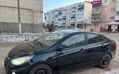 Hyundai Solaris II рестайлинг, 2011 год, 650 000 рублей, 3 фотография