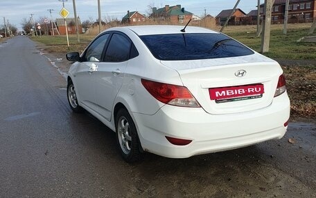 Hyundai Solaris II рестайлинг, 2013 год, 670 000 рублей, 11 фотография