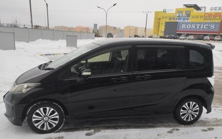 Honda Freed I, 2013 год, 1 300 000 рублей, 28 фотография