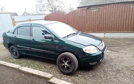 Toyota Corolla, 2003 год, 700 000 рублей, 4 фотография